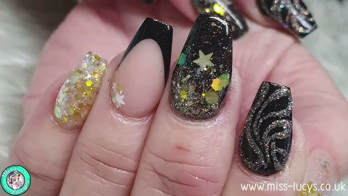 How can glitter be incorporated into black nail designs
