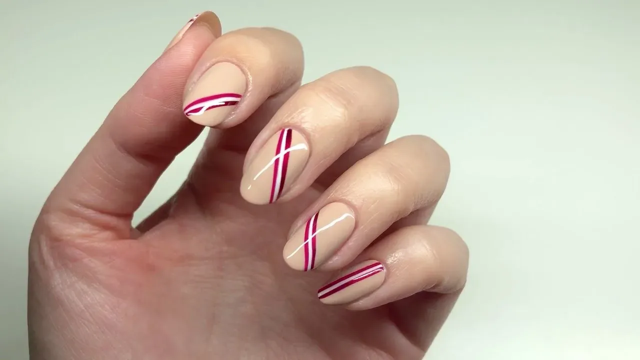 How can you create line art nail designs at home