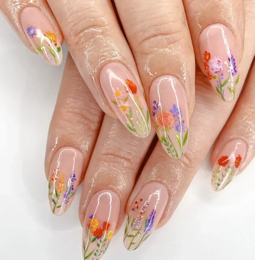 How can you incorporate floral designs into spring nails