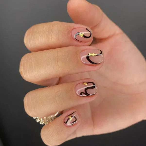 What are some edgy black nail designs suitable for short nails