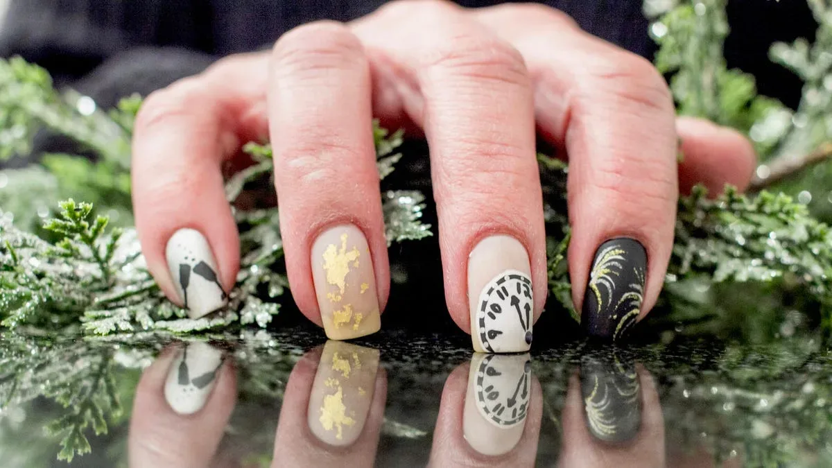 What are some festive nail art designs featuring fireworks or confetti