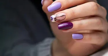 What are the various elements that can be incorporated into purple nail designs